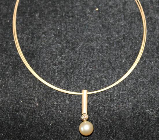 A modern 18ct gold, diamond and cultured pearl pendant necklace by Marion Autrum, drop 1.5in.